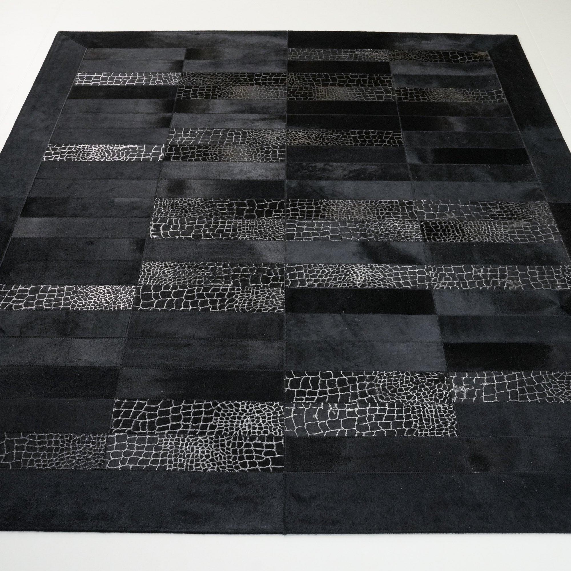 Geometric Patterned Black Leather Rug